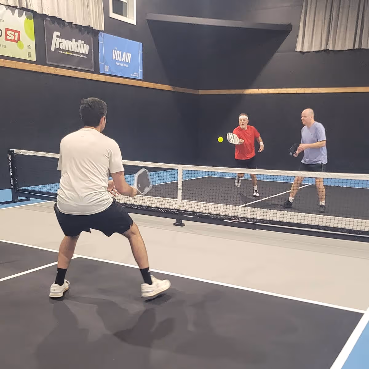 People playing pickleball at The Picklebarn ETX in Chandler TX